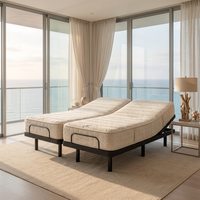 Split king adjustable bed with two independent mattresses in a modern bedroom