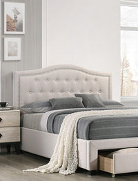 Side view of queen platform bed frame showing storage drawer at footboard
