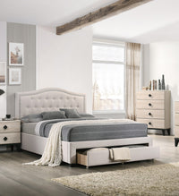 Close-up of button tufted arch headboard in light brown burlap fabric