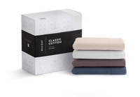  "Classic 200 thread count cotton sheets in crisp white showing breathable weave"