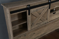 Two storage drawers underneath farmhouse queen bed frame
