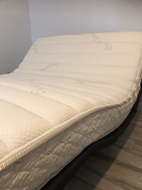 "Split queen latex mattress corner shot showing premium construction"