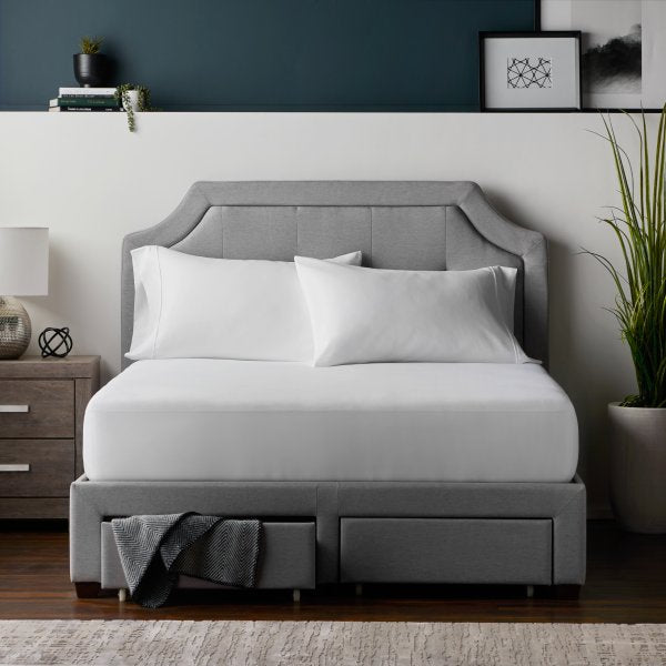 "Close-up of Prime Classic mattress protector smooth fabric surface showing breathable waterproof protection"