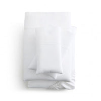 "Stack of sustainable TENCEL Lyocell bedding sheets with moisture-wicking properties"